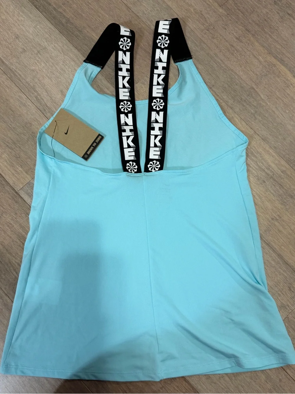 NIKE Women's Light Blue Tank with Black Logo Straps
